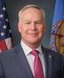 Official portrait of Alan Armstrong