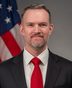 Official portrait of Jamieson Greer
